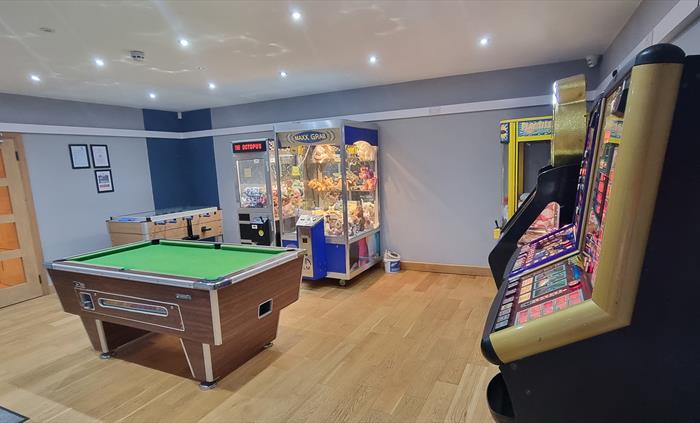 The Redford Cwtch Lounge – a cosy, welcoming space with soft seating, warm lighting, and rustic charm, perfect for relaxing with family or friends aft
